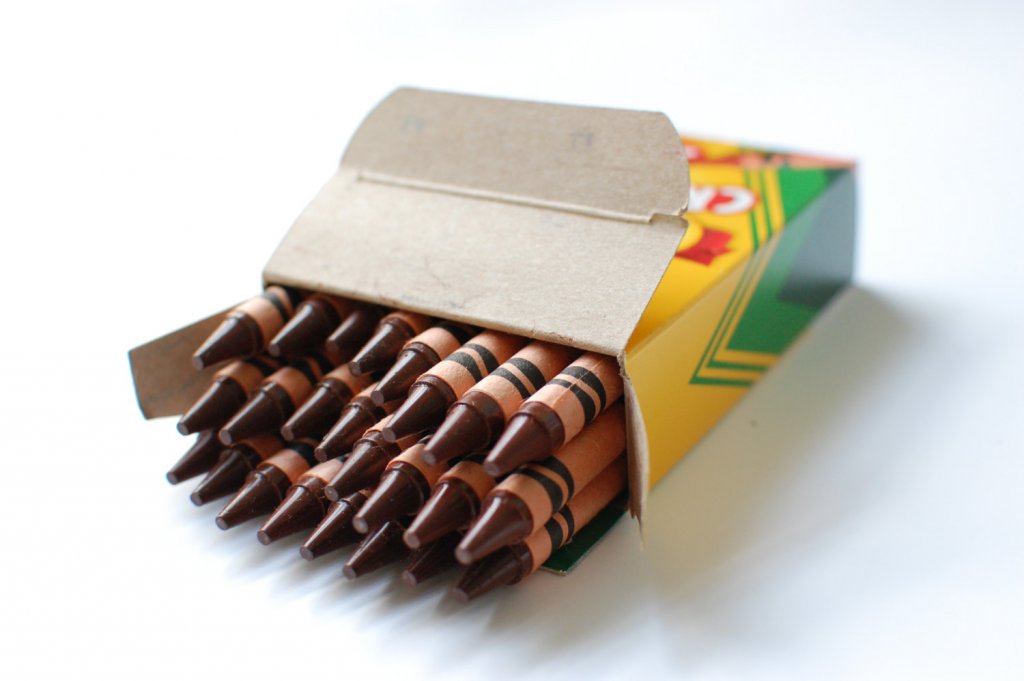 a box of crayons with all brown crayons
